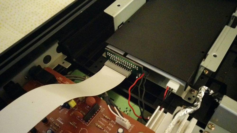 It's a DIY adapter with a 2-sided board and solder mask. I'm waiting for a batch of better boards from OSHpark.
